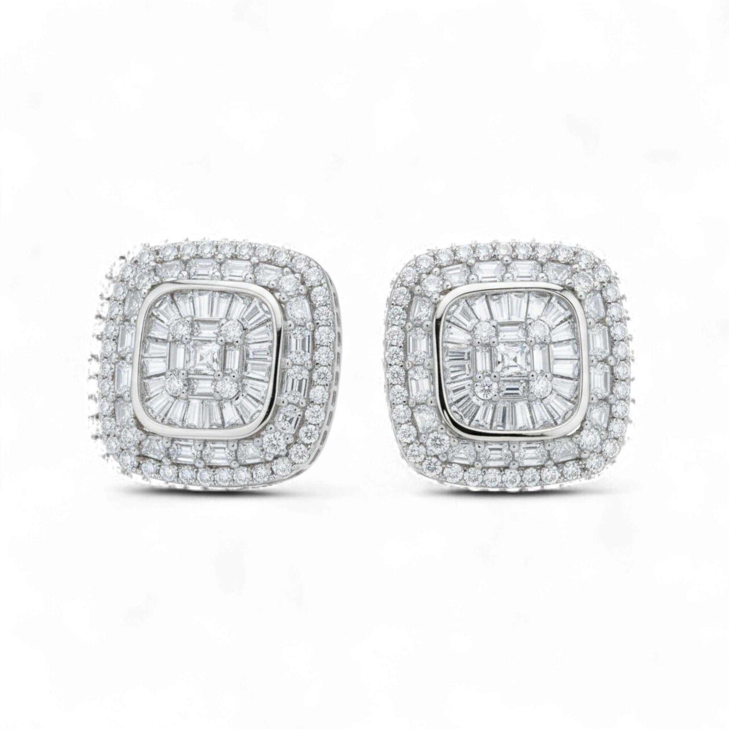 Pair of diamond earrings on a white background