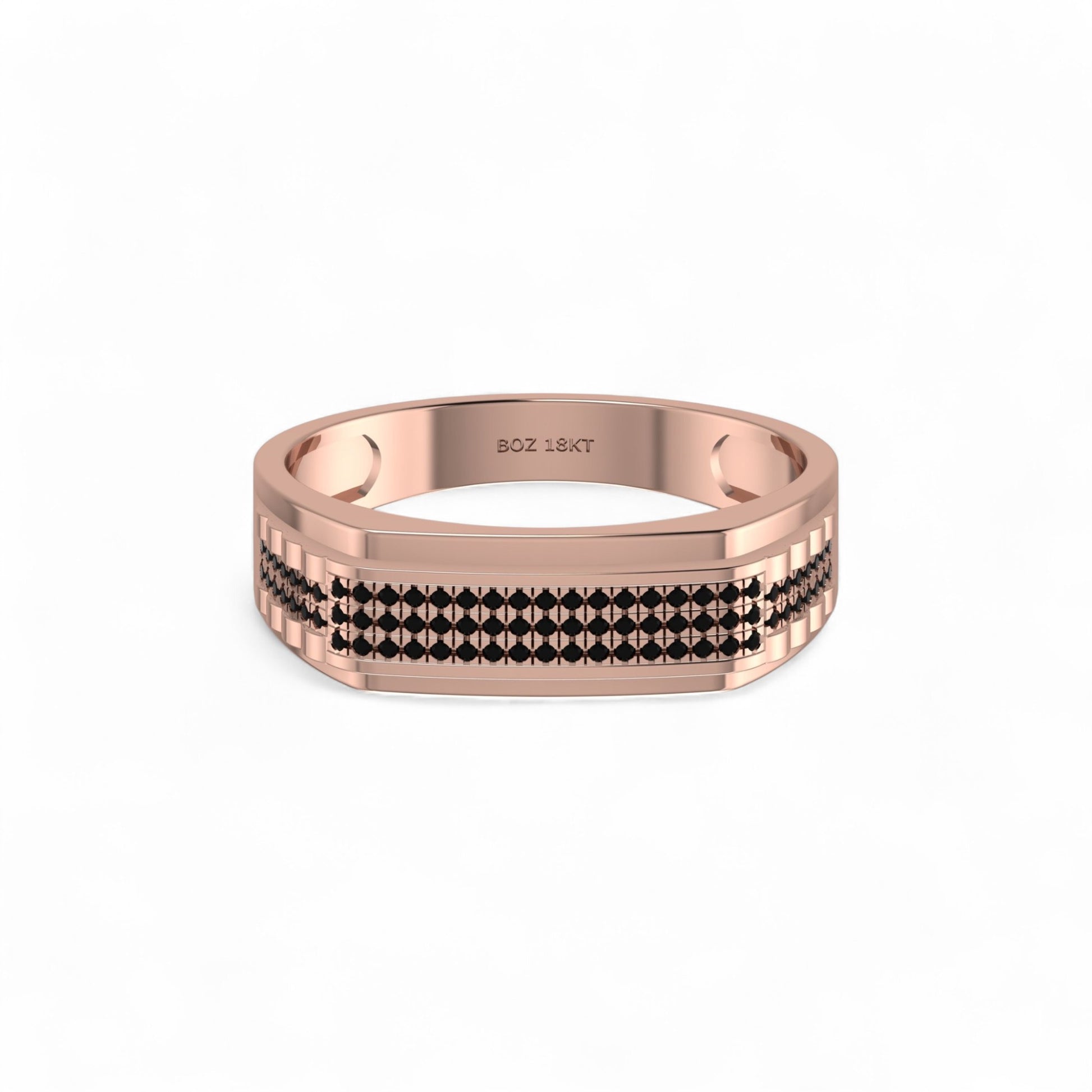 Rose gold ring with black diamond pattern on a white background