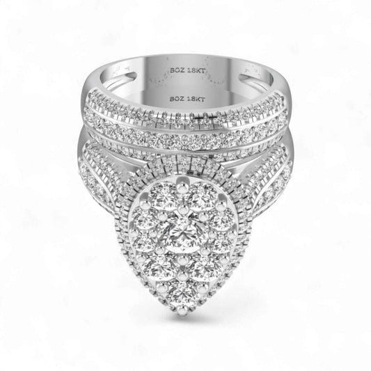 Silver ring with diamond accents on a white background