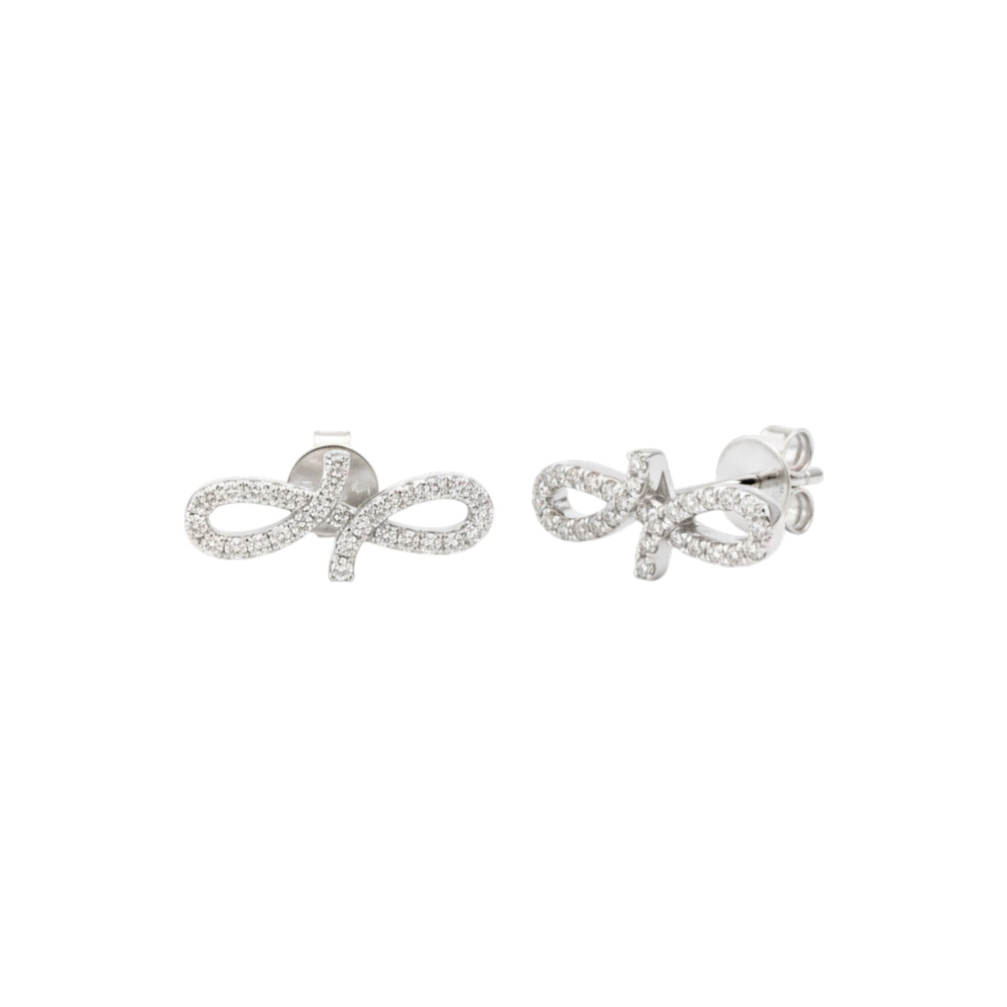 Silver bow-shaped earrings with clear stones on a white background