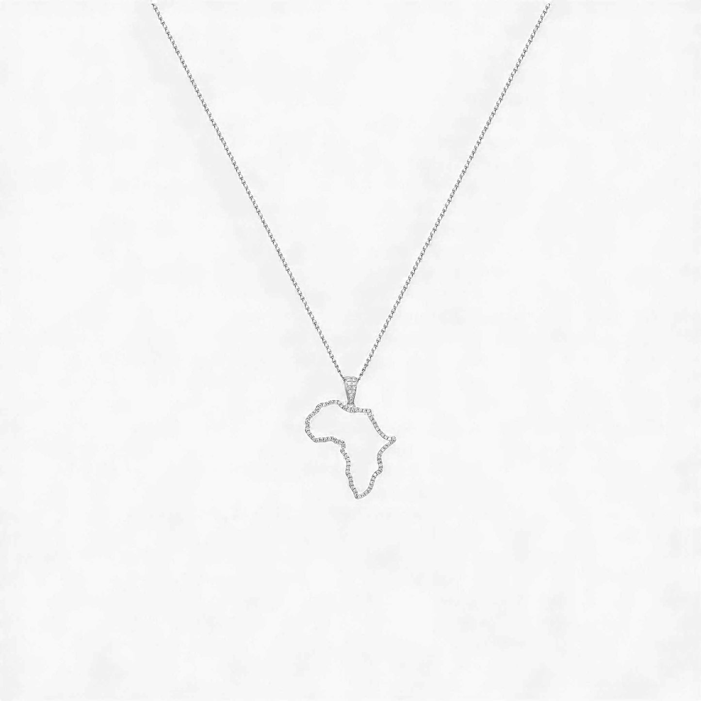Necklace with a pendant shaped like the continent of Africa on a white background