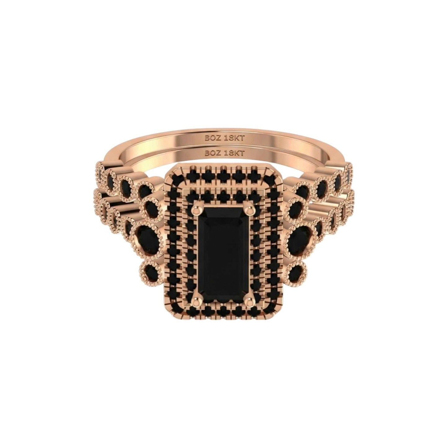 Rose gold ring with black gemstone on a white background