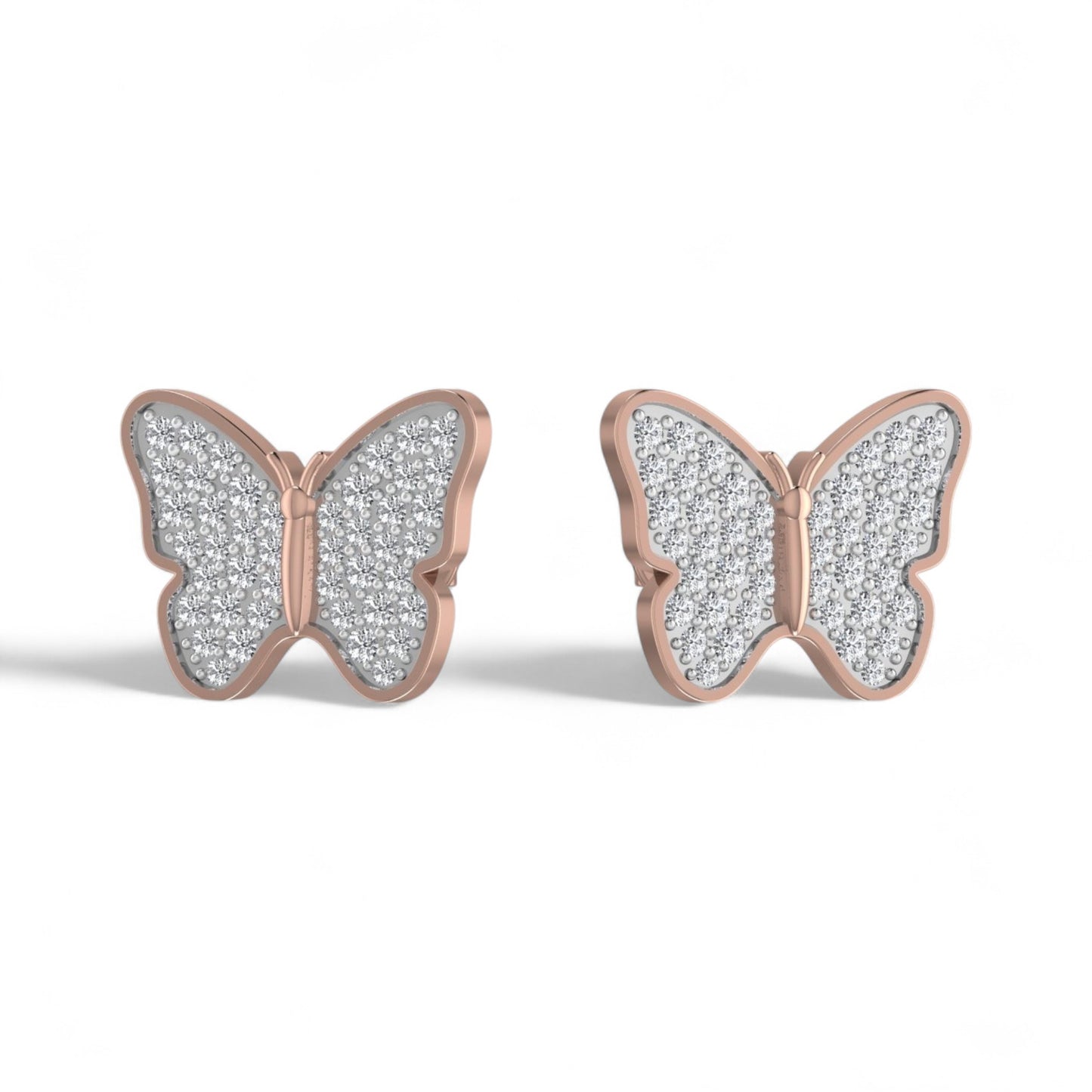 Butterfly-shaped earrings with rose gold frame and clear gemstones on a white background