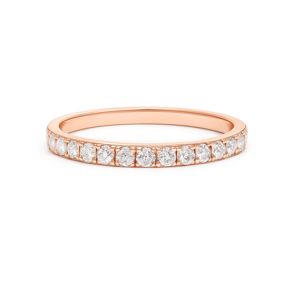 Rose gold ring with small diamonds on a white background