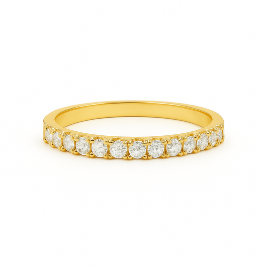 Gold ring with small diamonds on a white background