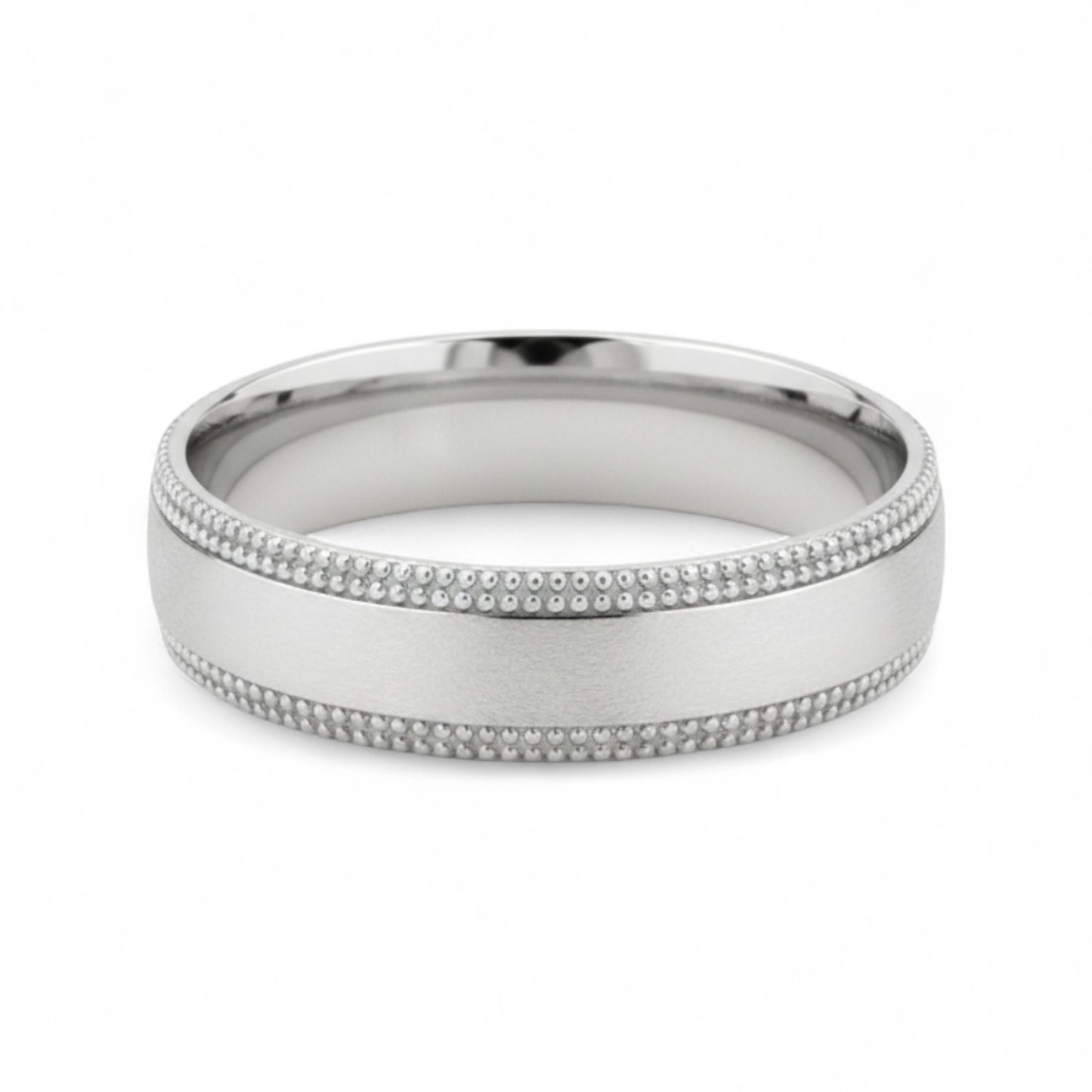 Silver ring with milgrain detailing on a white background