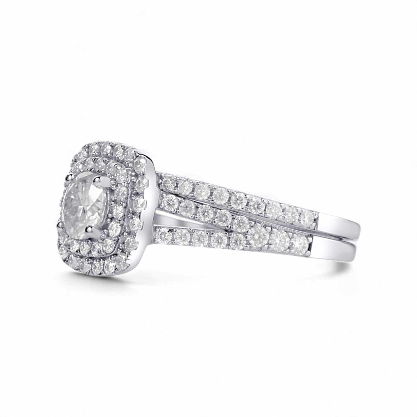 Silver ring with diamond accents on a white background