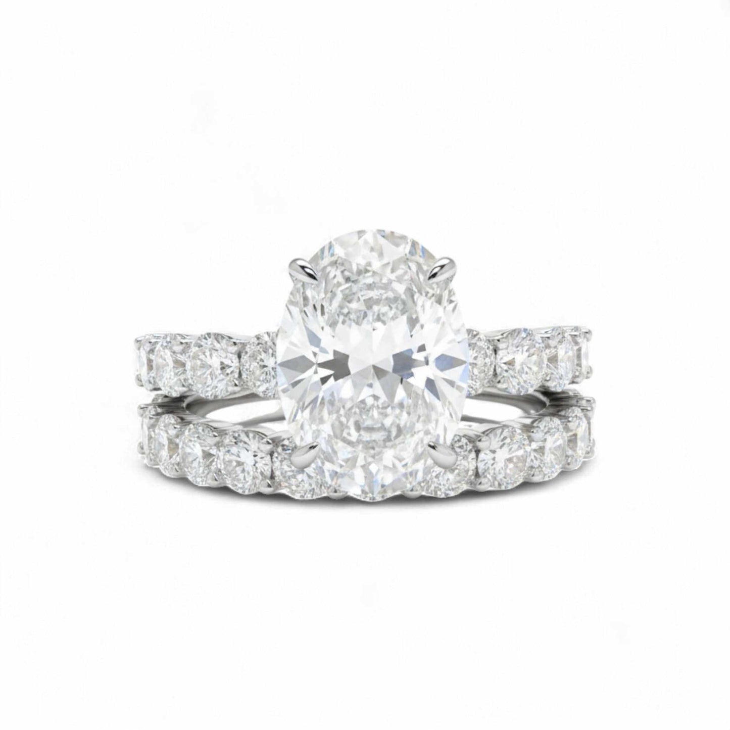 Beatrice CZ Bridal Set in 925 Sterling Silver with oval cubic zirconia solitaire and pavé-set CZ band