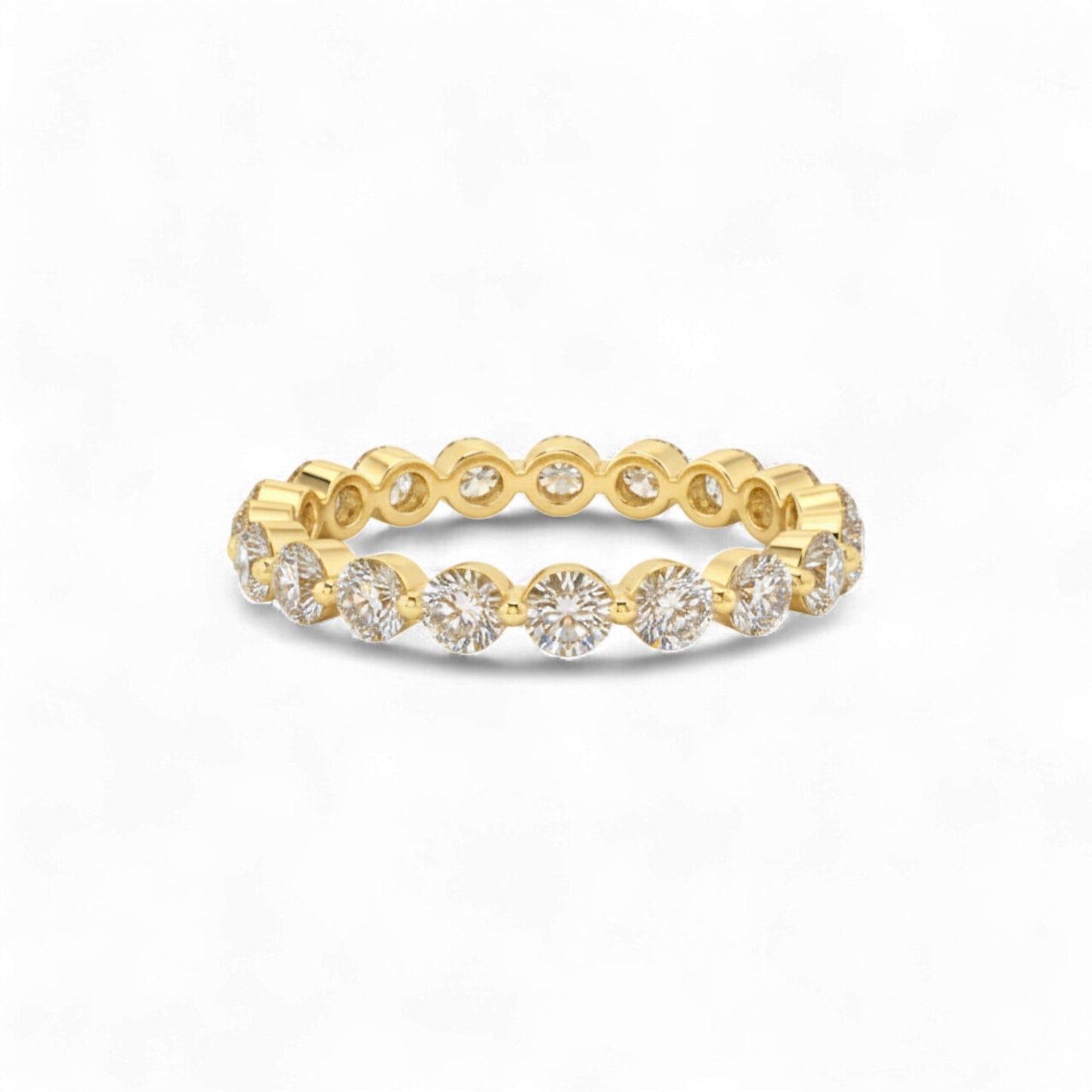 Gold ring with diamonds on a white background