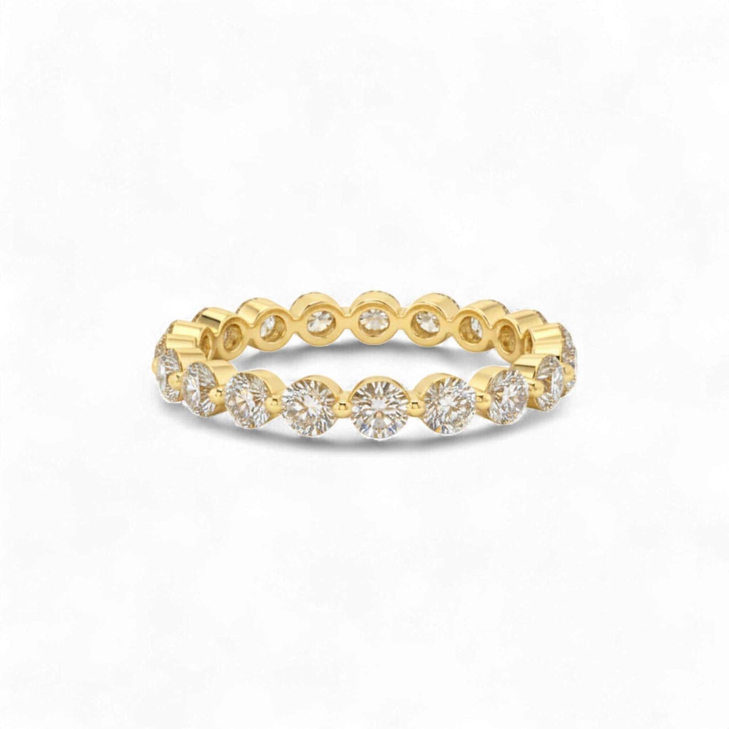 Gold ring with diamonds on a white background