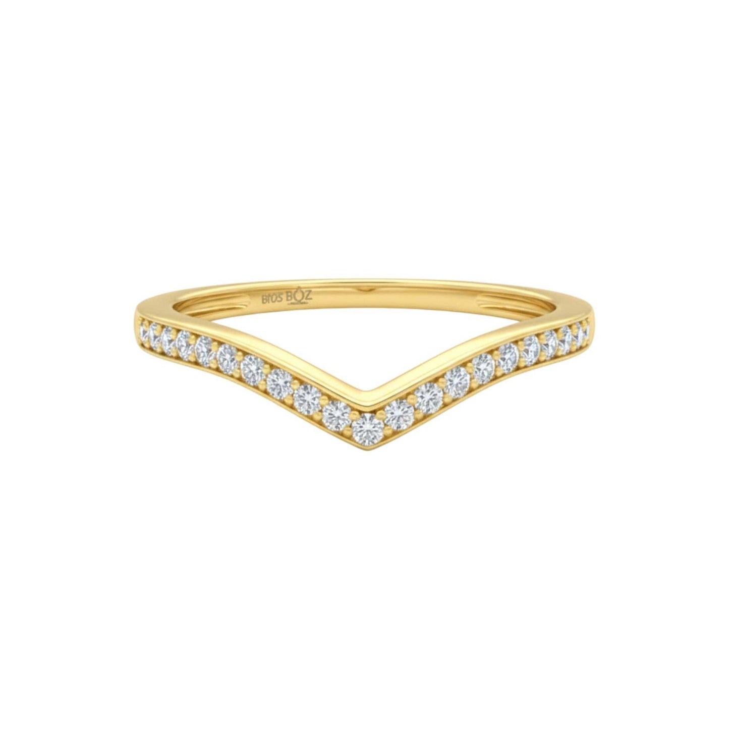 Gold ring with diamond accents on a white background