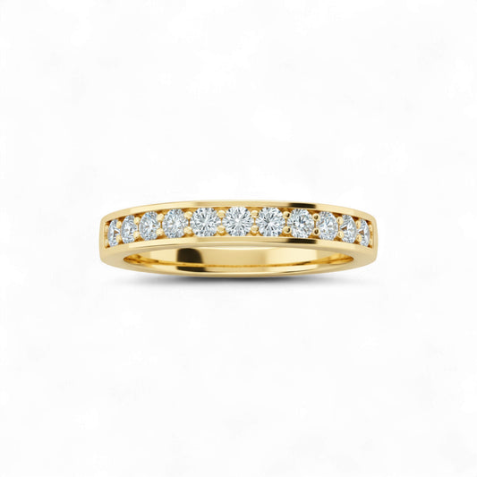 Gold ring with diamonds on a white background