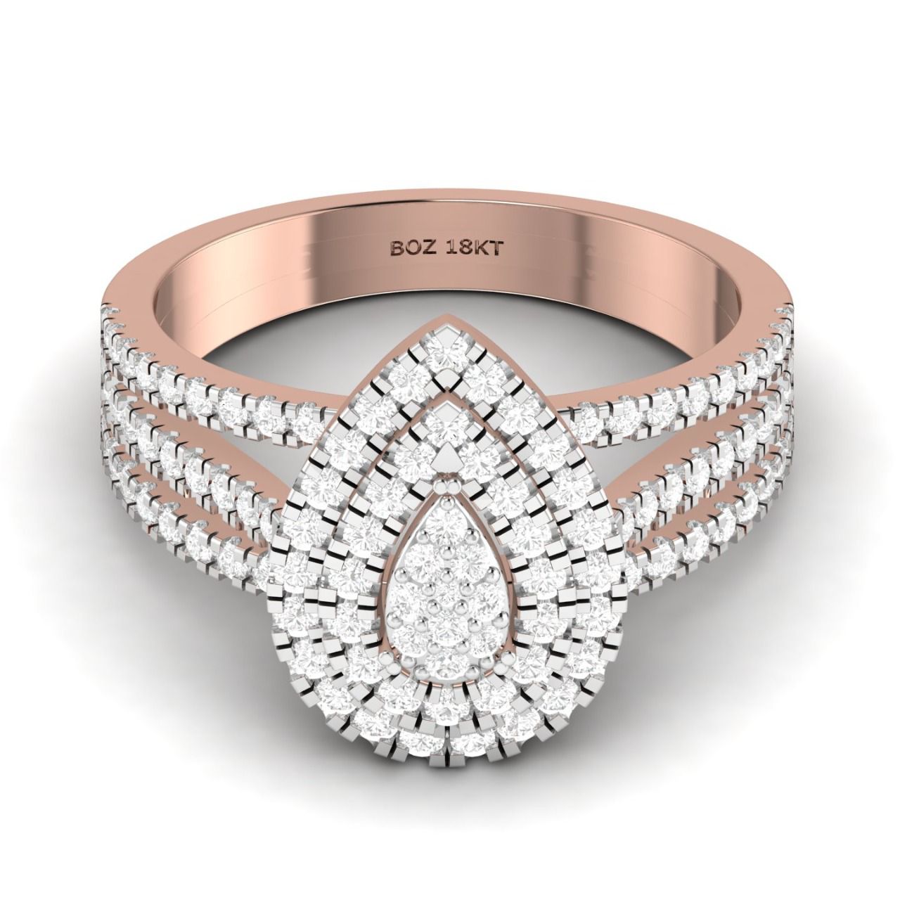 A pear cut diamond cluster engagement ring with smaller diamonds set in 18K gold band