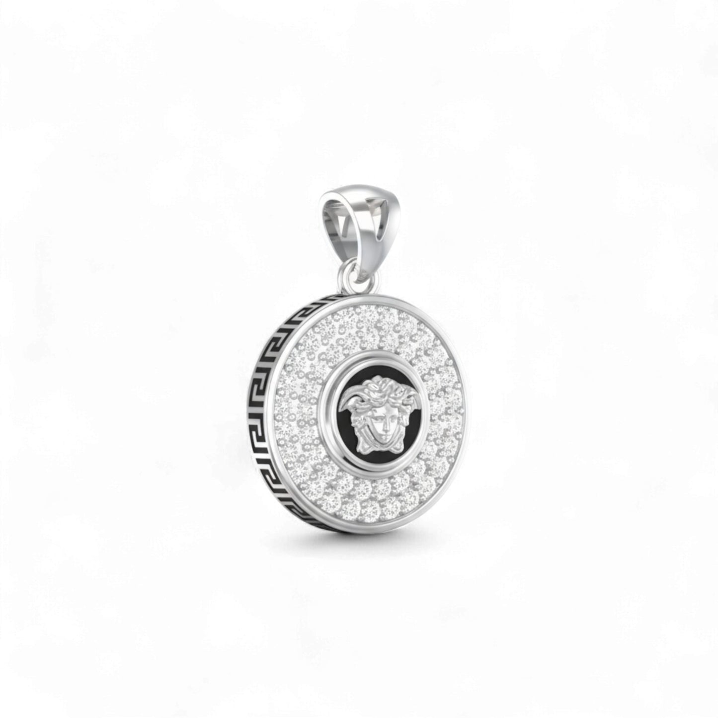 Silver pendant with gemstones on a white background