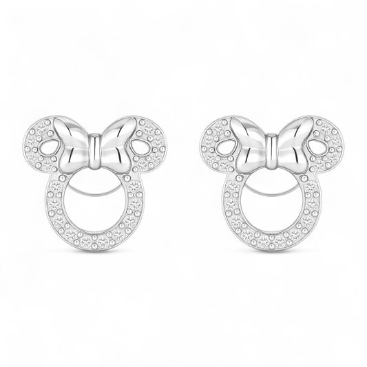 Silver bow-shaped earrings with clear stones on a white background