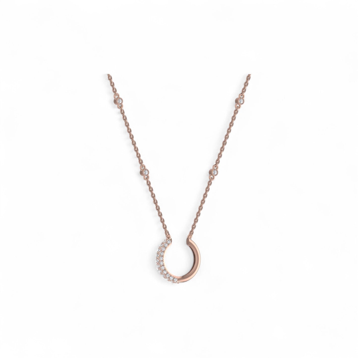 Rose gold horseshoe necklace with small diamonds on a white background