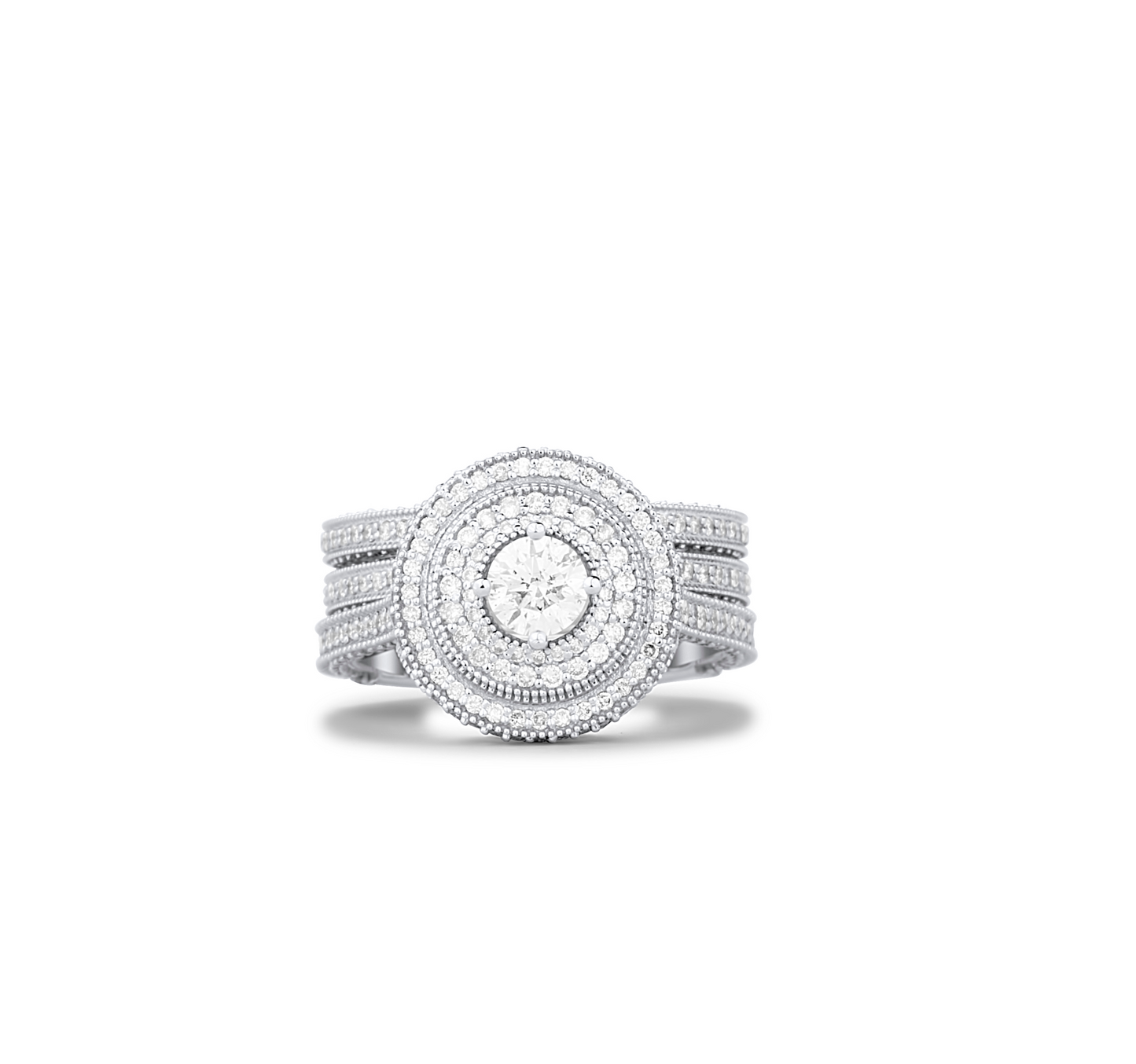 Silver ring with multiple bands and diamond accents on a white background