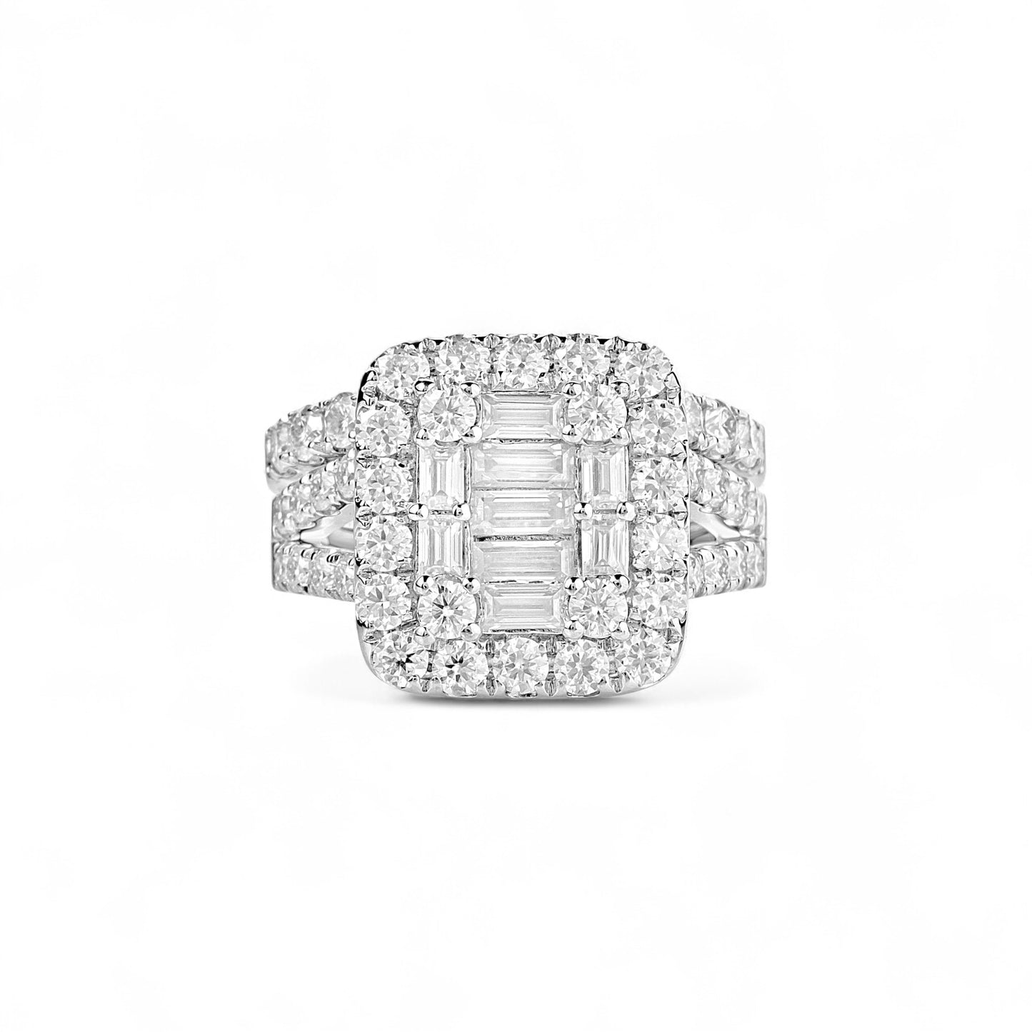 Diamond ring with emerald-cut center stone on a white background