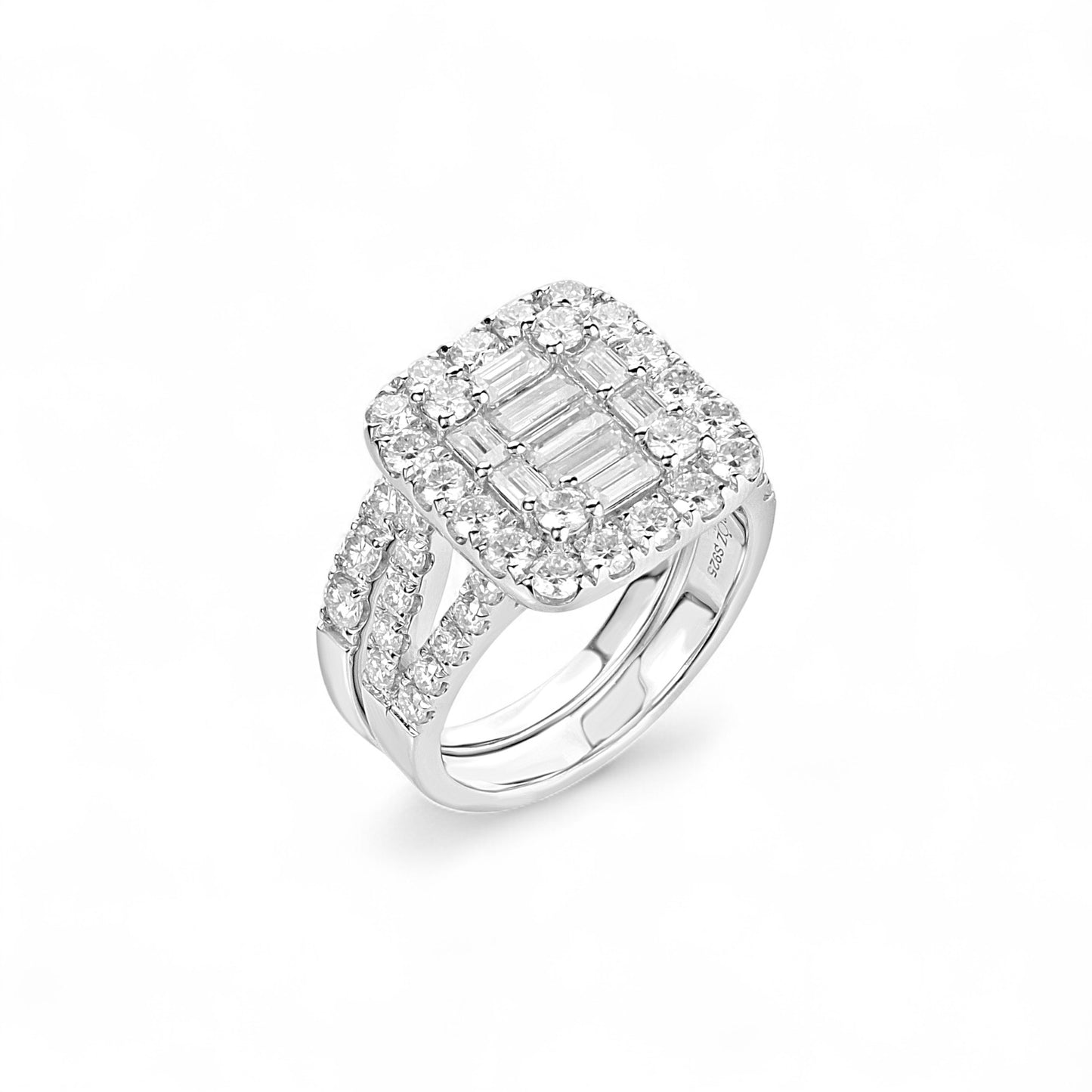 Diamond ring with a rectangular stone on a white background