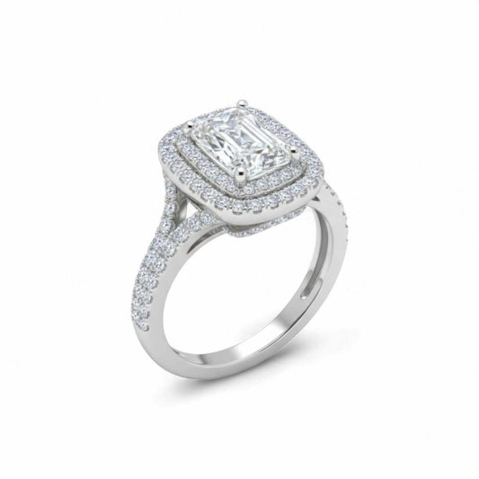 Diamond ring with a rectangular center stone on a white background