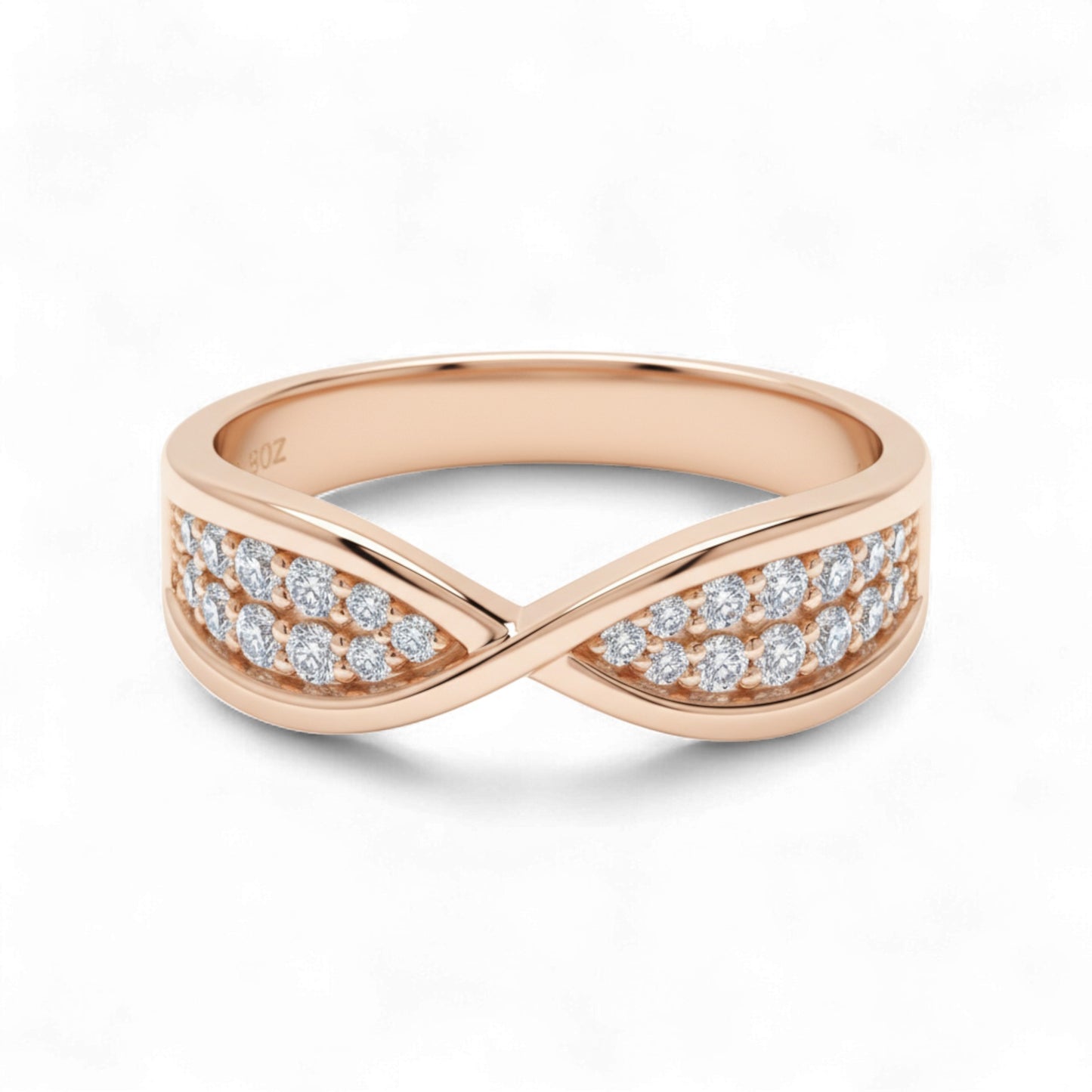 Rose gold ring with diamond accents on a white background
