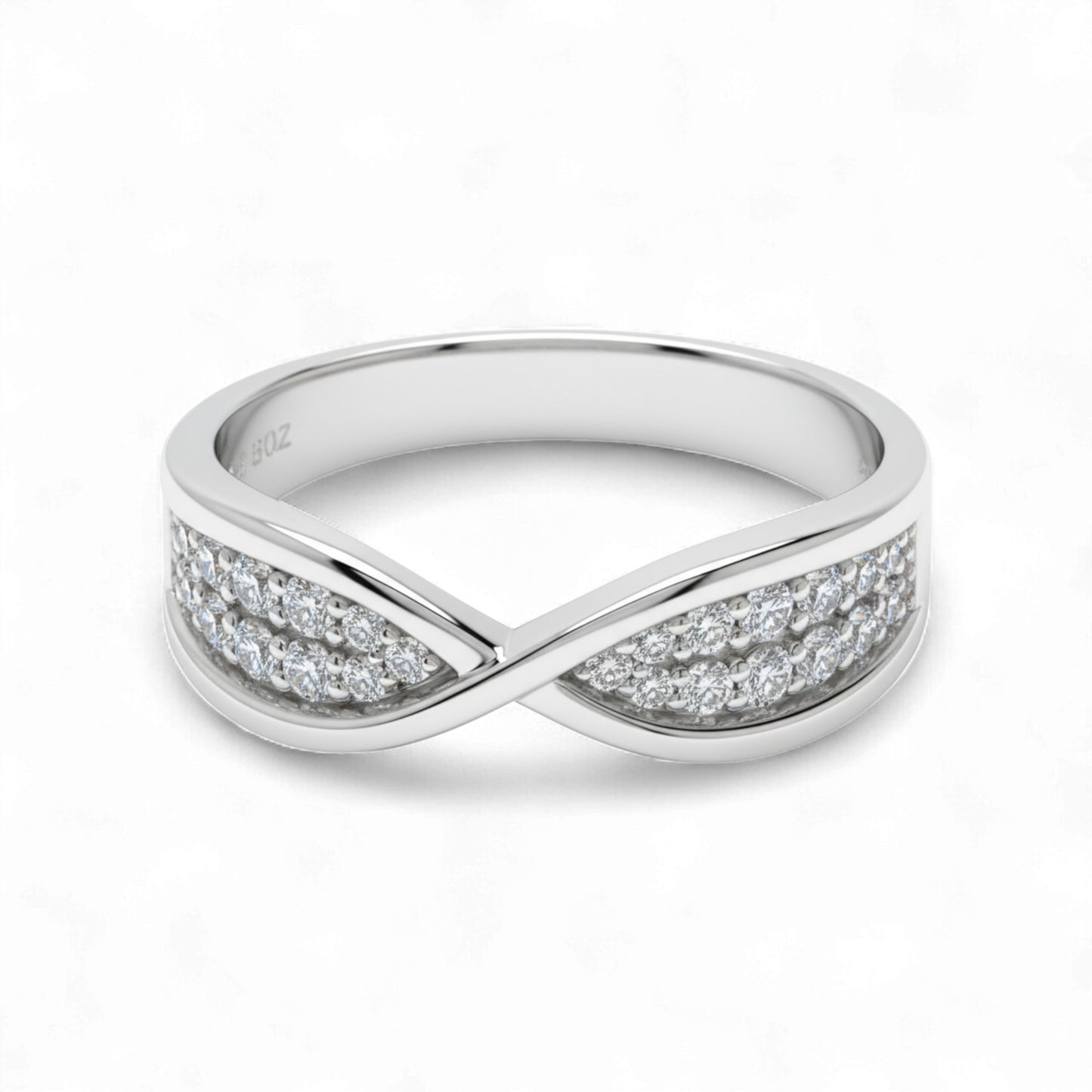 Silver ring with diamond accents on a white background