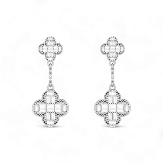 Pair of silver earrings with clover-shaped designs on a white background
