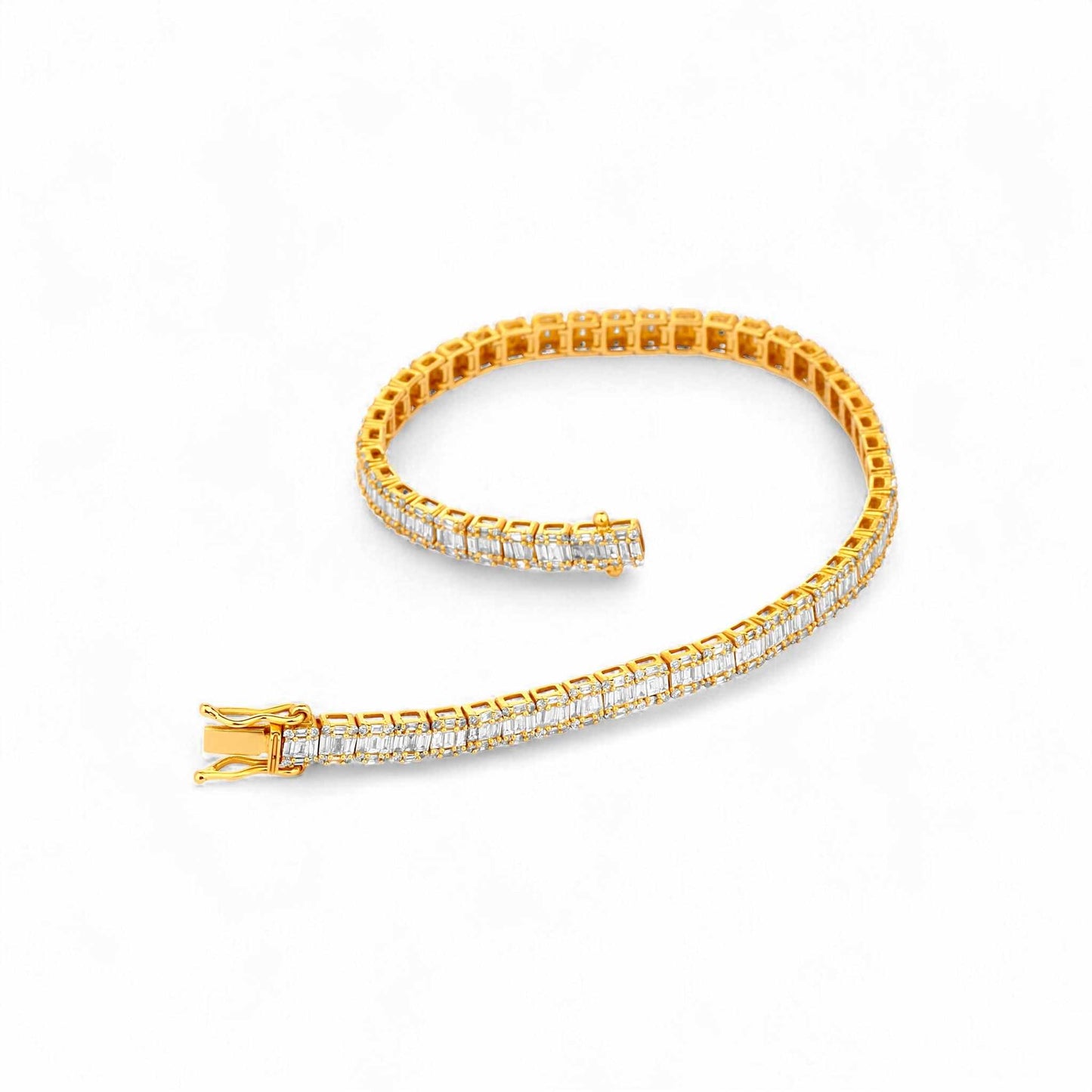 Gold bracelet with clear stones on a white background