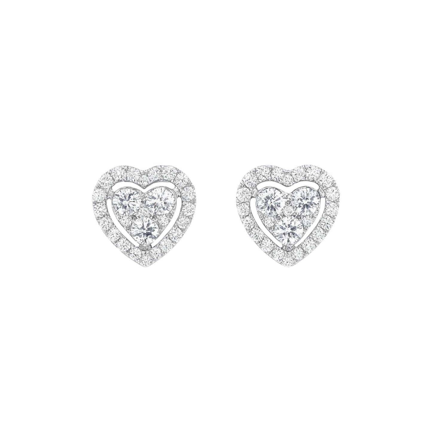 Heart-shaped diamond earrings on a white background