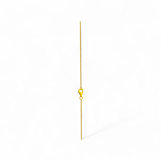 Gold chain necklace on a white background