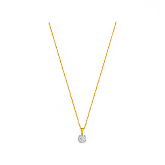 Gold necklace with a round pendant on a white background