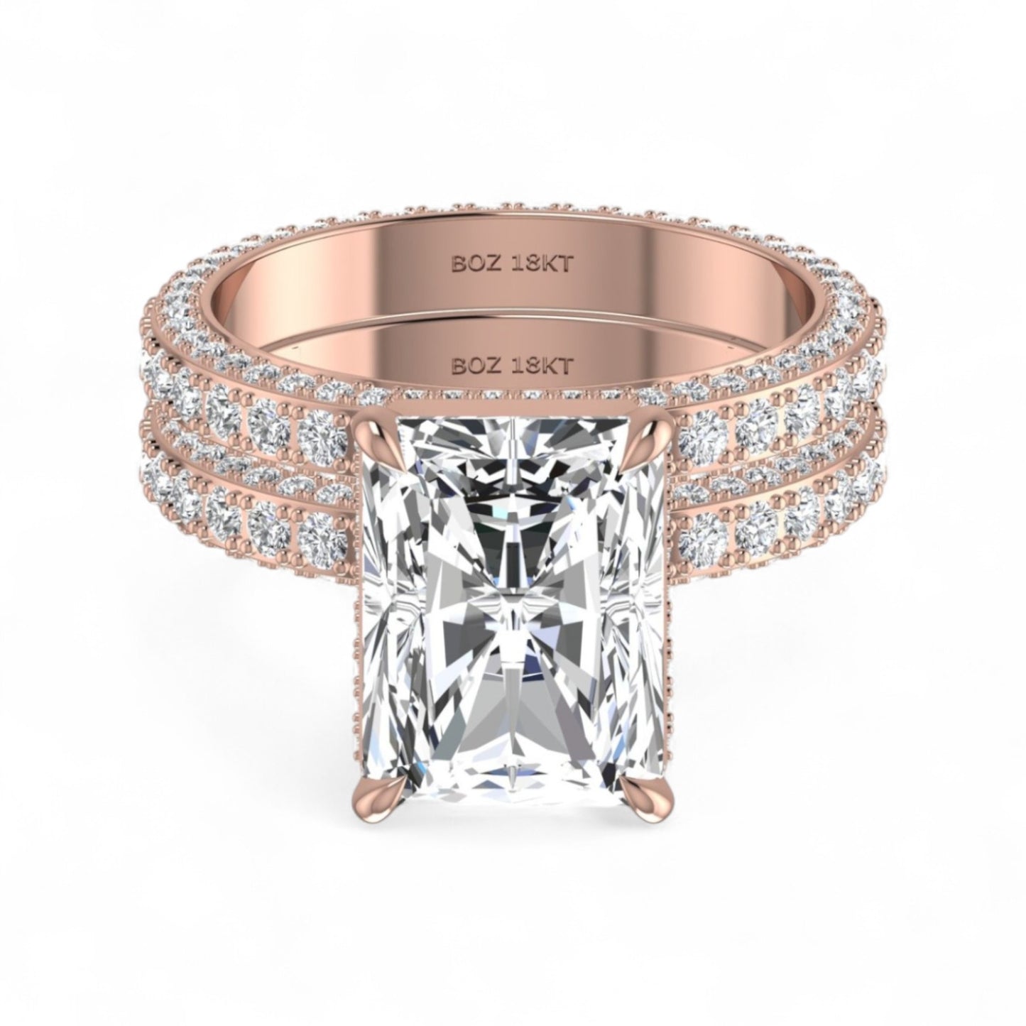 Rose gold ring with a large diamond and smaller diamonds on the band against a white background