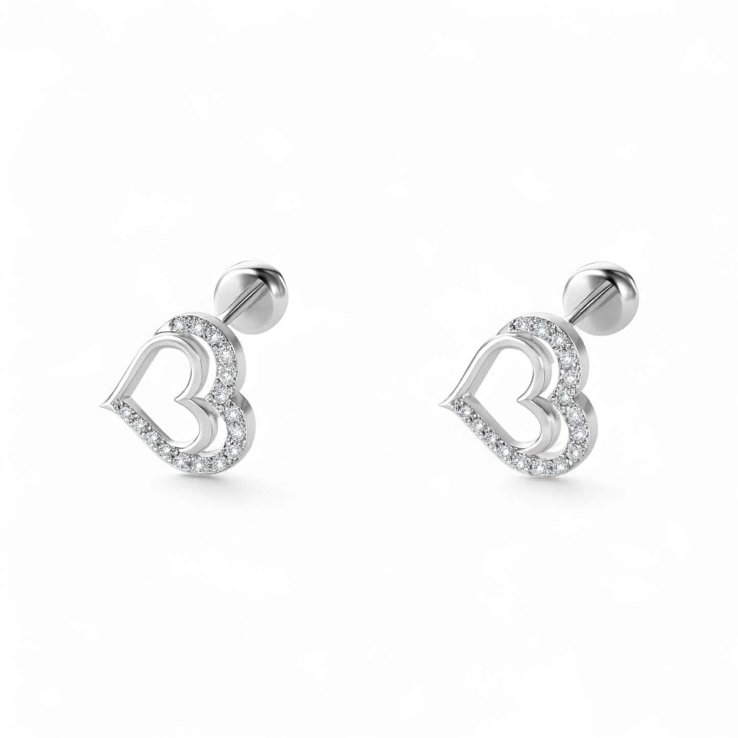 Heart-shaped silver earrings on a white background