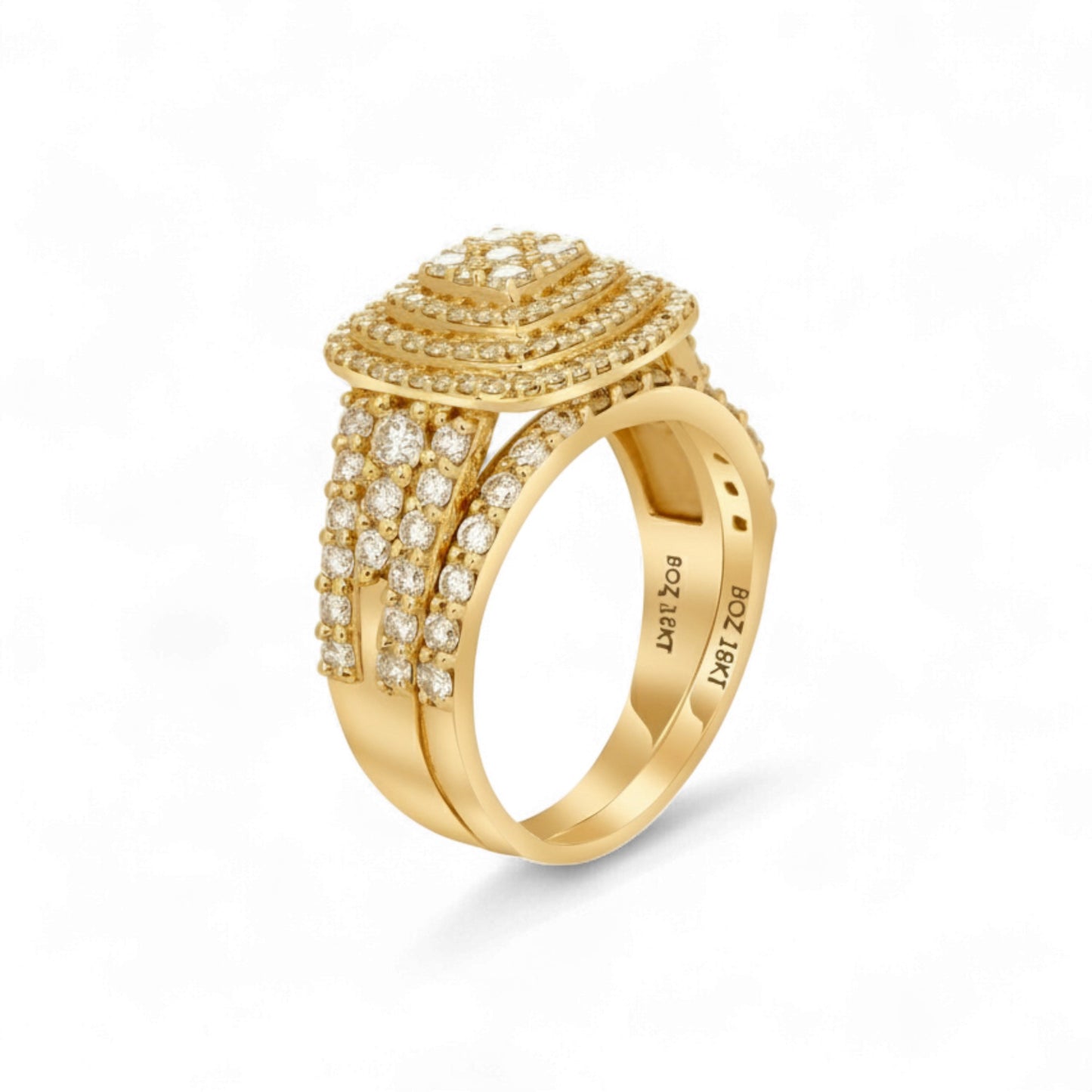 Gold ring with diamond accents on a white background