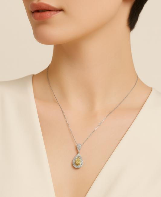 Necklace with a pendant worn by a model on a neutral background