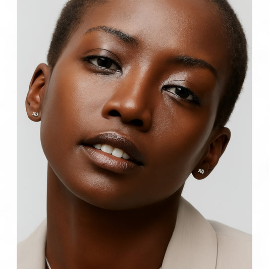 Close-up of a woman's face with a neutral background
