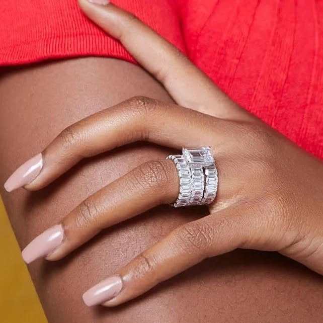 Calla CZ Bride Set sterling silver rings with emerald-cut and baguette cubic zirconia on hand