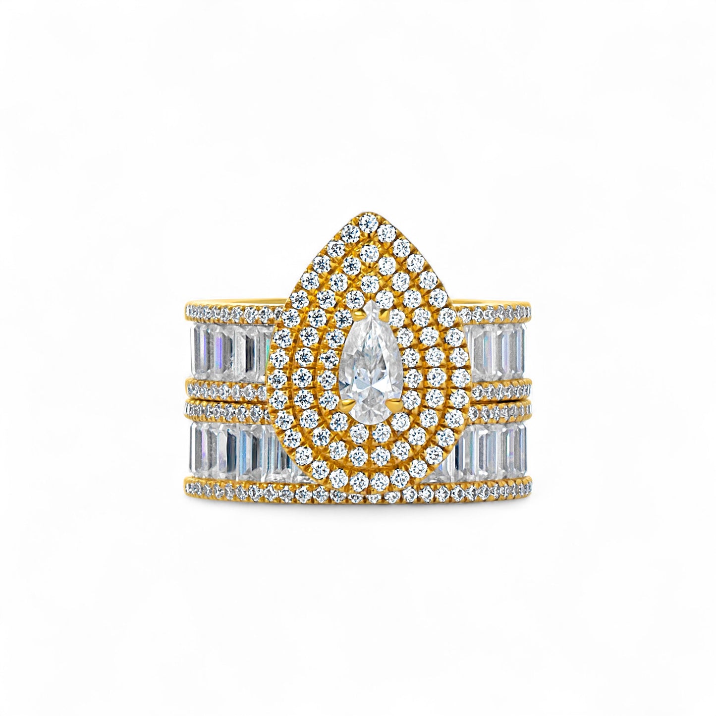 Gold and silver ring with diamond accents on a white background