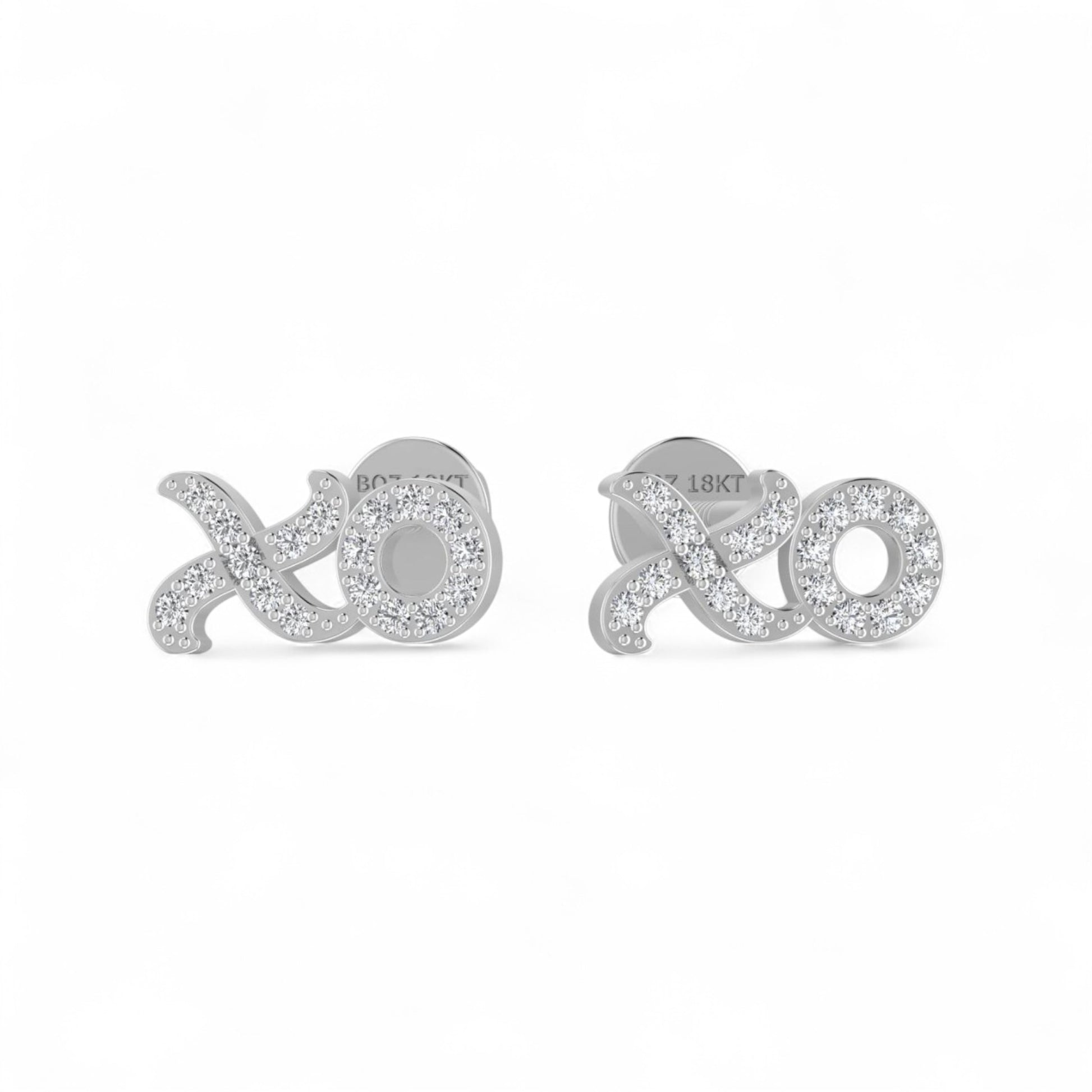 Silver 'xoxo' earrings on a white background