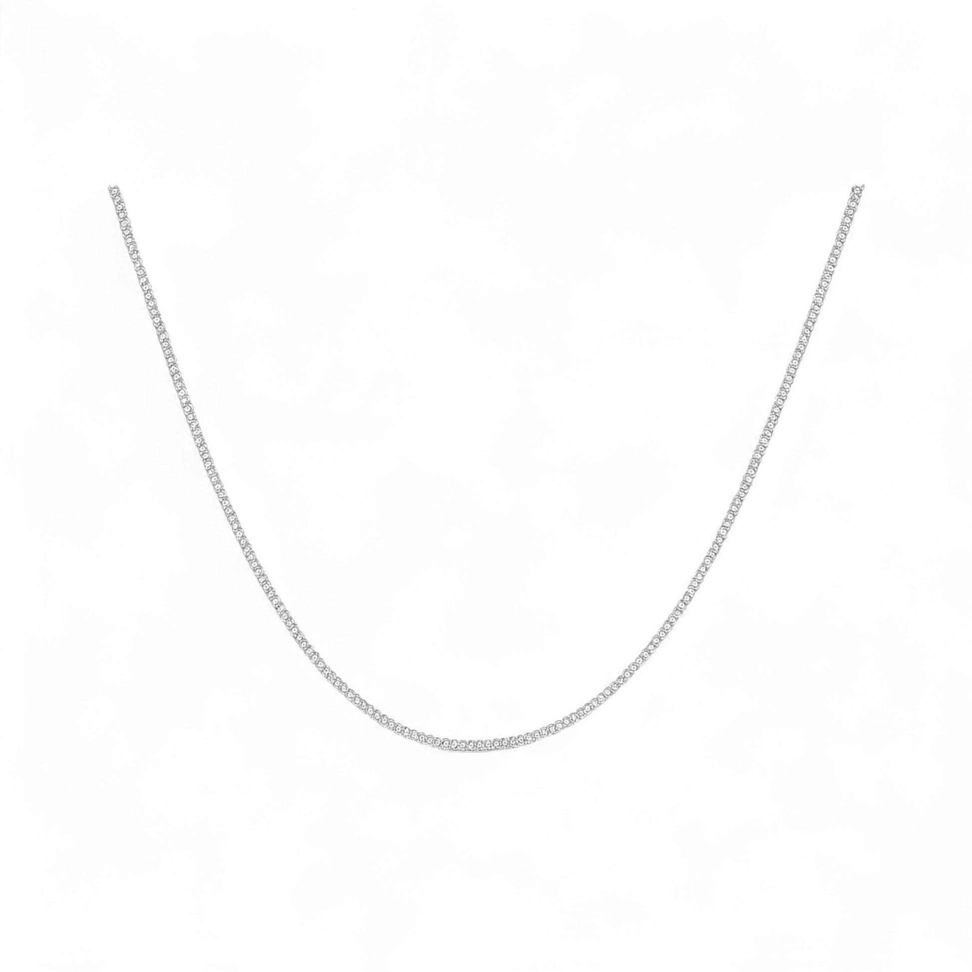 Silver chain necklace on a white background