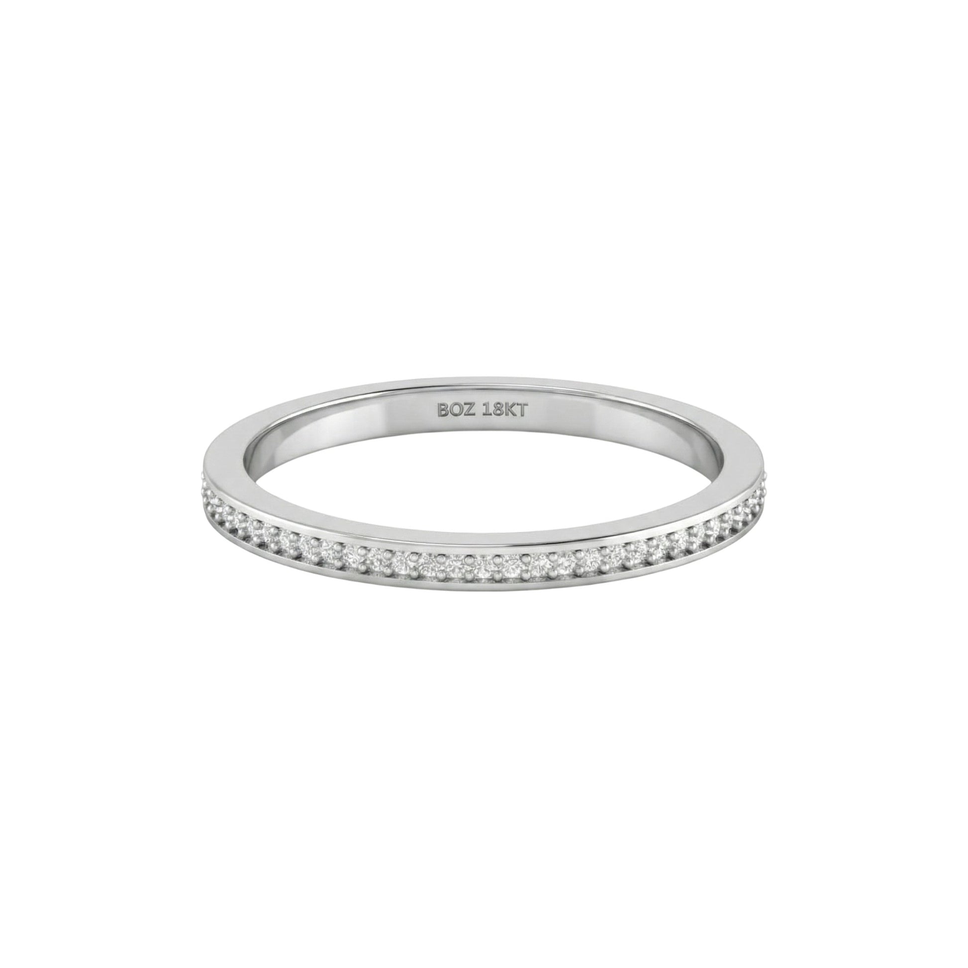 Silver ring with small diamonds on a white background