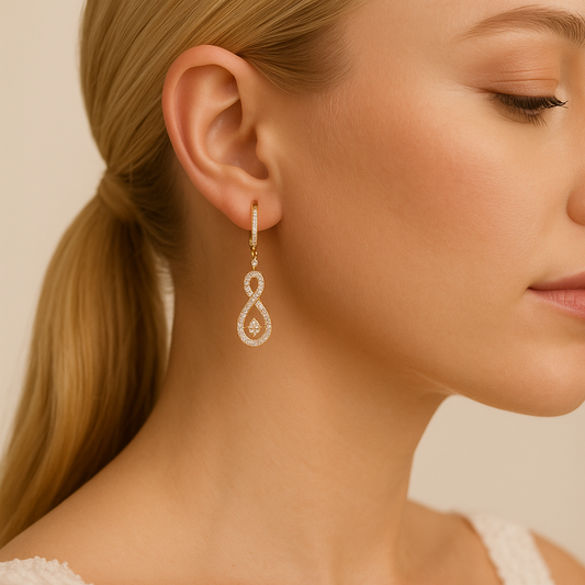 Close-up of a woman wearing a diamond earring with a neutral background