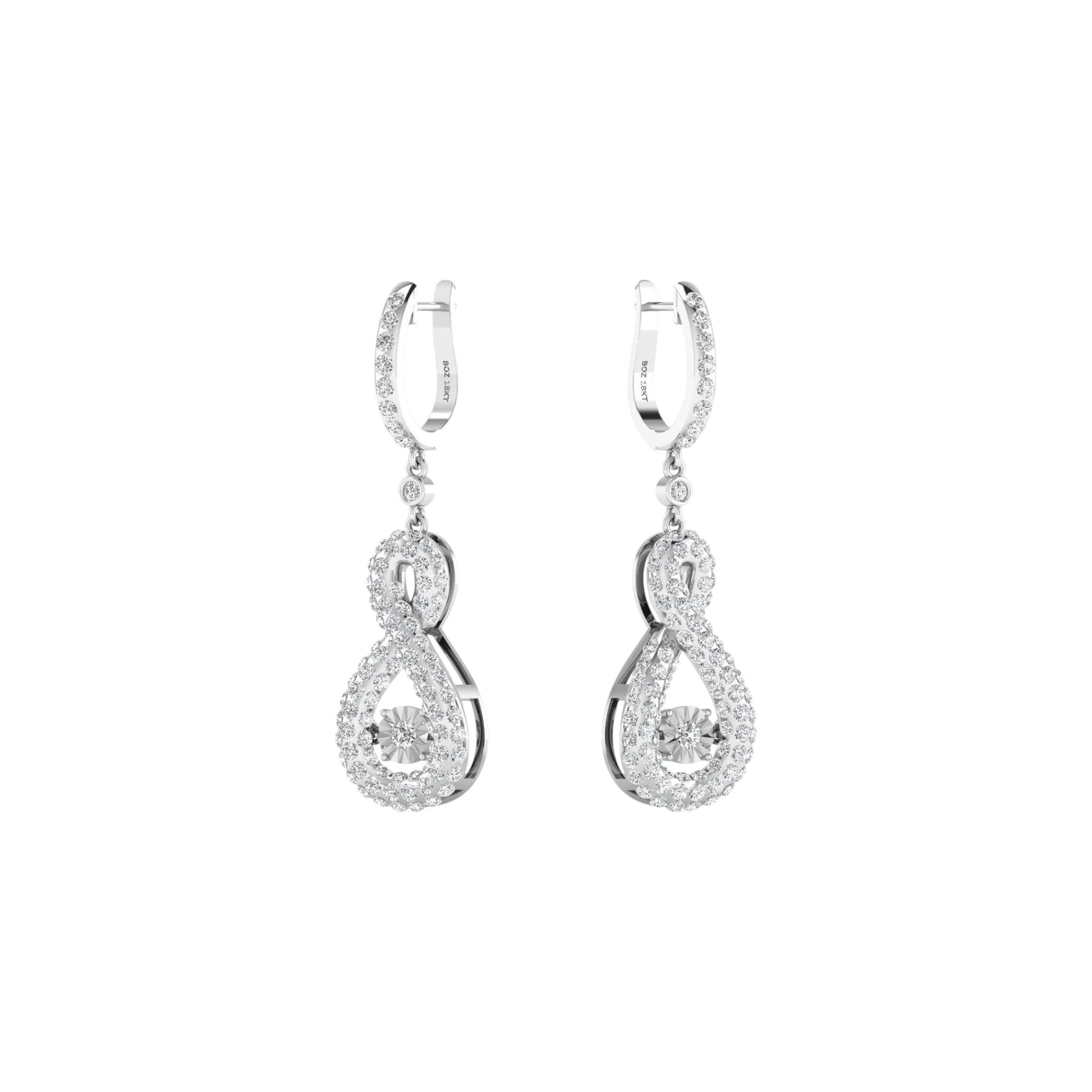 Pair of silver hoop earrings with diamond accents on a white background