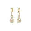 Gold and diamond earrings on a white background