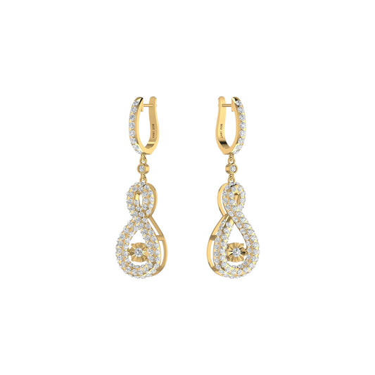 Gold and diamond earrings on a white background