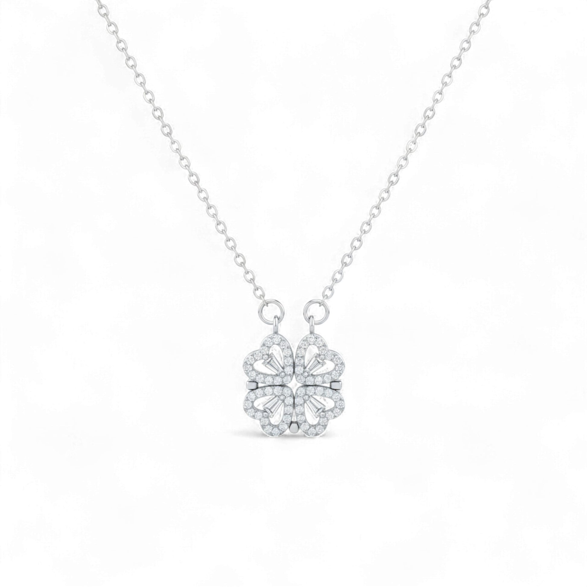 Butterfly-shaped silver earrings on a white background