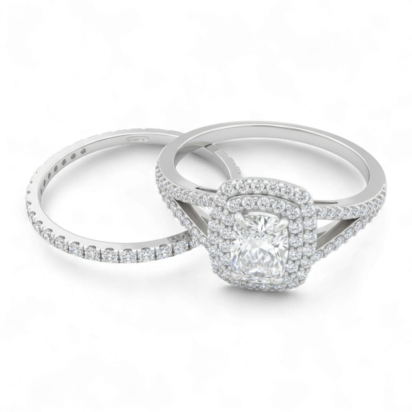 Two silver rings with diamond accents on a white background