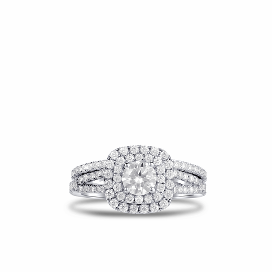 Diamond ring with a halo design on a white background