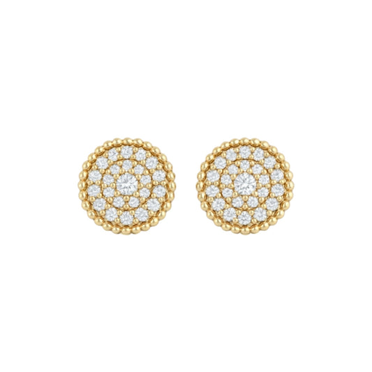 Gold earrings with diamond-studded circular design on a white background