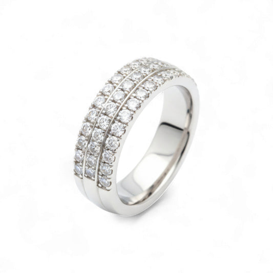 Silver ring with multiple rows of diamonds on a white background